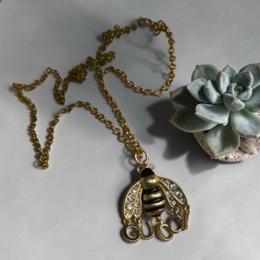 Gold Bee Pendant Necklace with Black Enamel Stripes